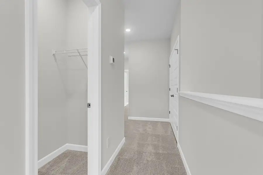 Spacious, unfurnished interior of a new home in Pineland Preserve, Summerville (Image 37).