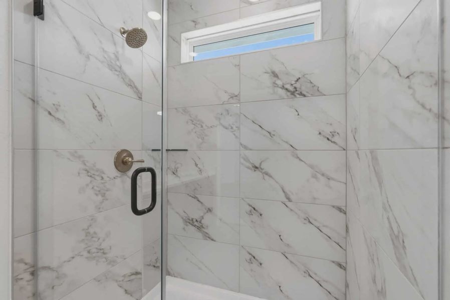 Representative interior finishes for a home built from the Dillon by Chesmar Homes in Sienna Courtyard, Missouri City (Image 16).