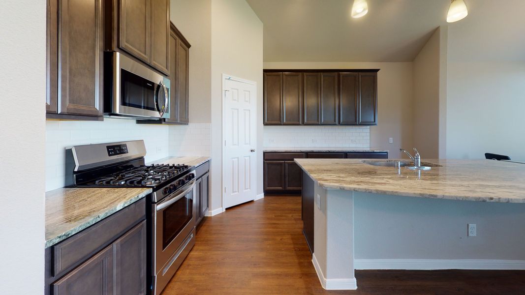 Representative furnished interior of a home built from the Floor Plan 3256 by Colina Homes in Grand Magnolia, Magnolia (Image 36).