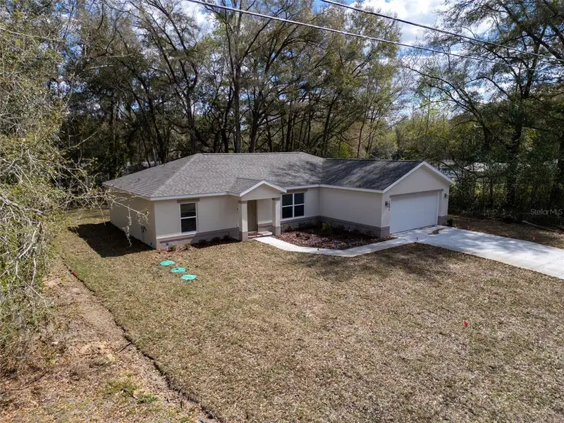 Exterior details and patio area of a home in , Summerfield (Image 3).