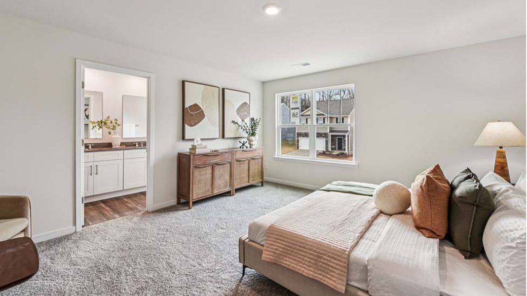 Representative furnished interior of a home built from the Darwin by D.R. Horton in Reedy Creek Preserve, Charlotte (Image 14).