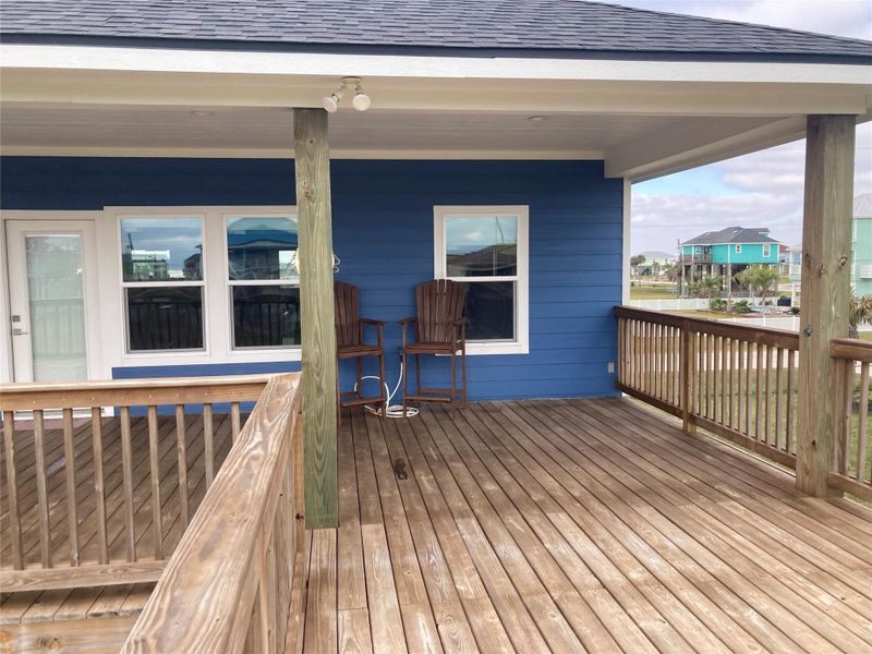 Walk out to the gulf and bay facing covered decks with over a 1000 square feet for entertaining, grilling or gorgeous sunrise and sunset views. If in need of a tan, the gulf facing deck includes a large space for this.