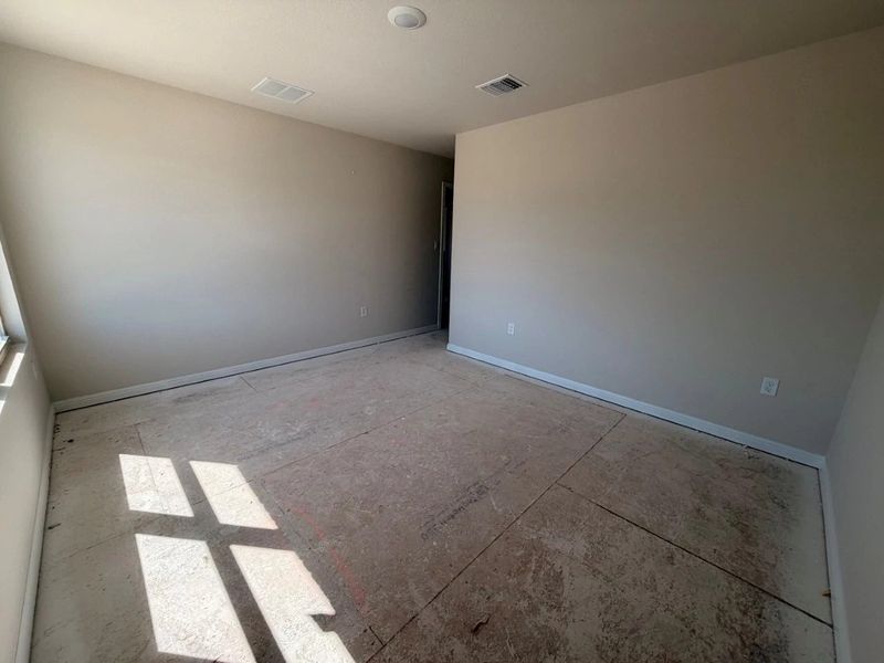 In-progress construction of a new home in The Colony, Bastrop, TX (Image 22).