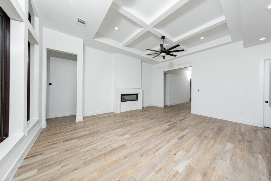 An additional view of this spacious family room highlighting the main focal point - FIREPLACE!