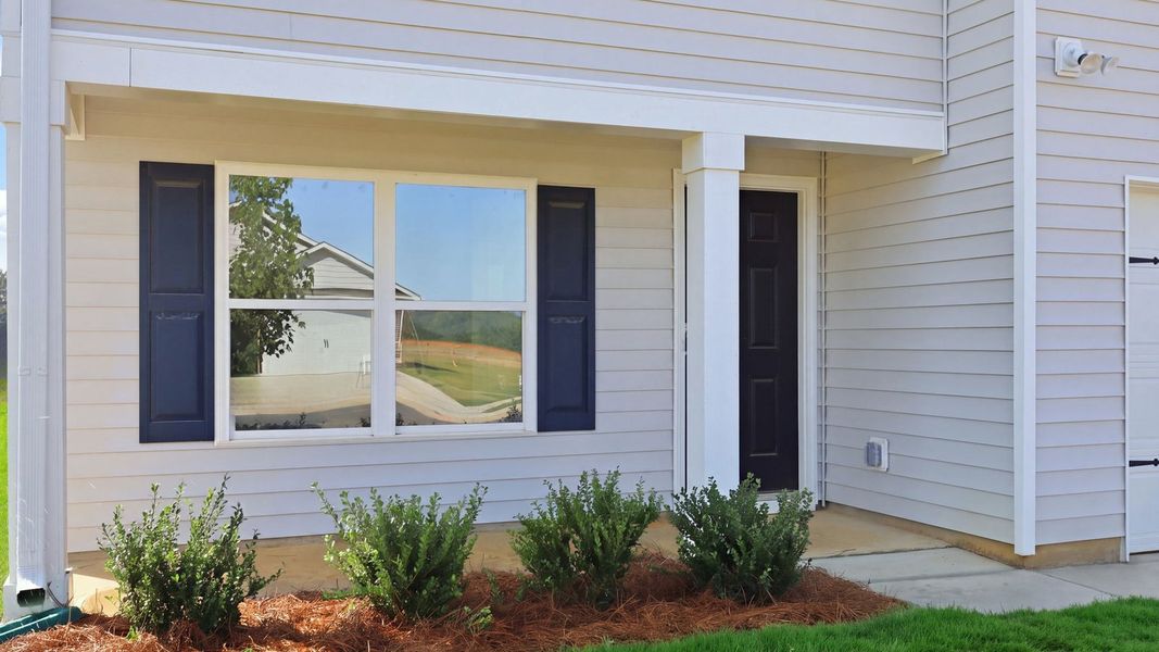 Exterior details and patio area of a home in Bynum Farms, Farmville (Image 3).