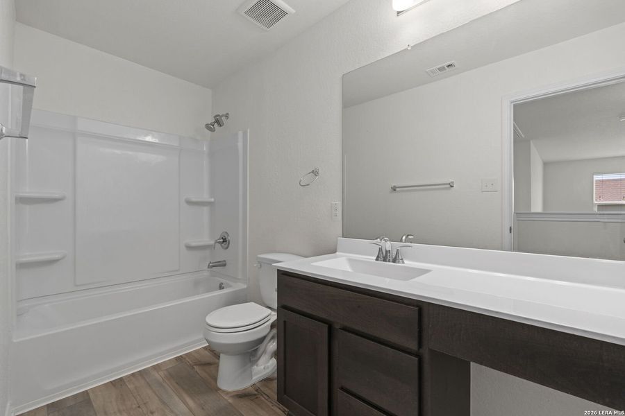 Furnished interior view inside a new home in Parklands, Schertz (Image 17).