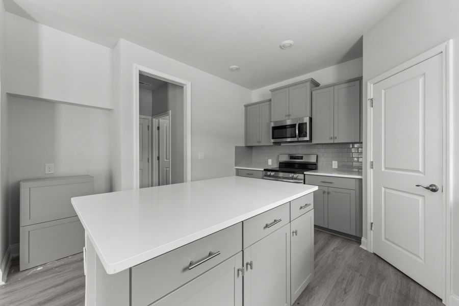 Furnished interior in a model home at Rutledge in Shallotte (Image 10).