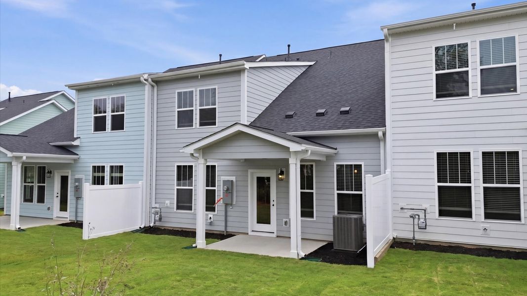Exterior details and patio area of a home in Village at Midway, Anderson (Image 3).