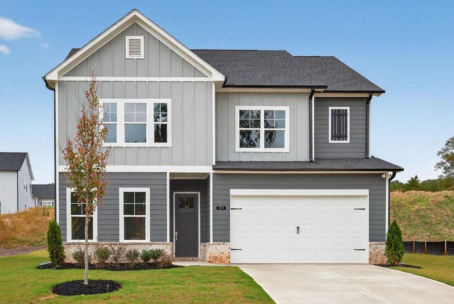 Front exterior of a new home in Red Bird Manor, Jefferson, GA, highlighting curb appeal (Image 1).