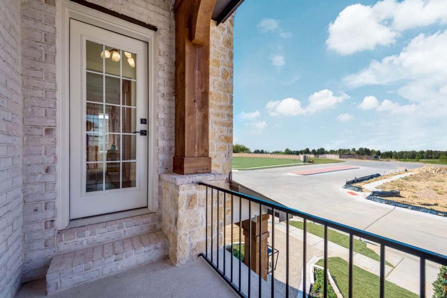 Exterior details and patio area of a home in Justin Crossing, Justin (Image 2).
