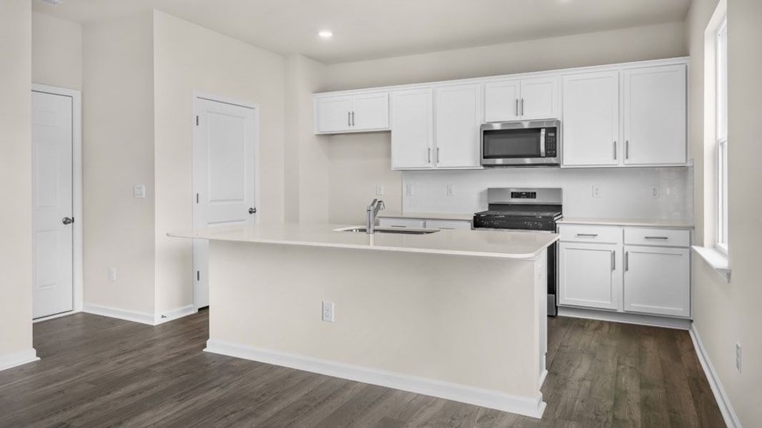 Representative furnished interior of a home built from the Belhaven by D.R. Horton in Galvins Ridge, Sanford (Image 6).