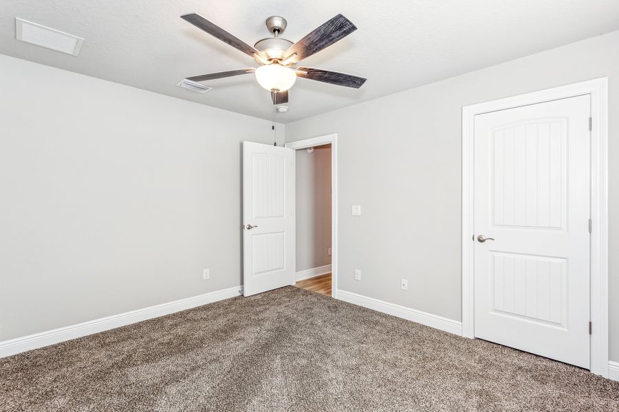 Representative unfurnished interior of a home built from the The Carlos by Herbst Homes in Doyle Hawkins Landing, Navarre (Image 97).