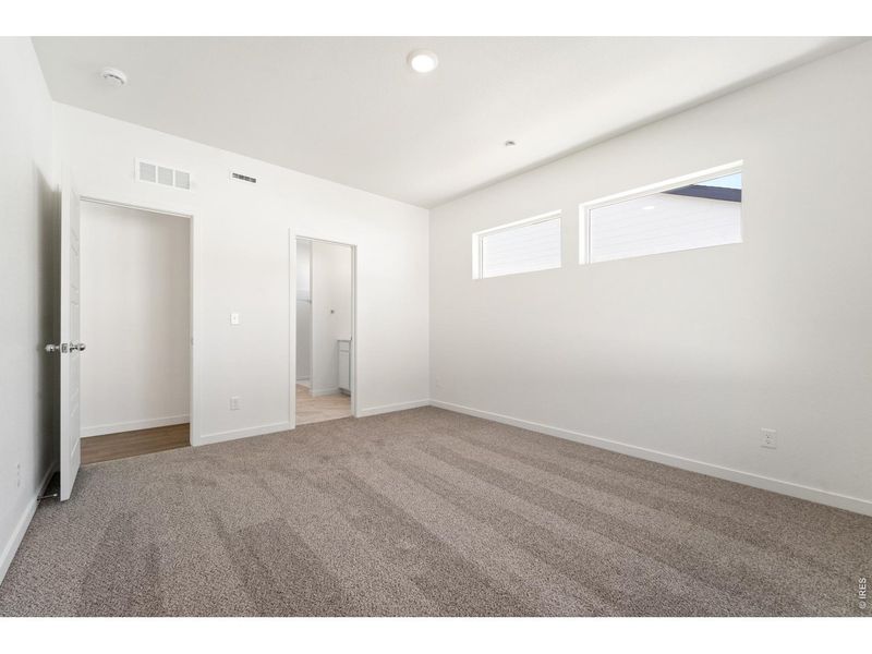 Spacious, unfurnished interior of a new home in Union Colony West, Greeley (Image 15).