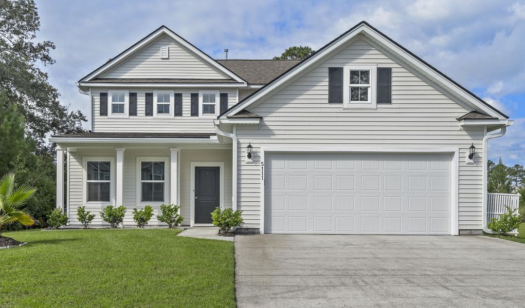 Front exterior of a new home in , Johns Island, SC, highlighting curb appeal (Image 1).