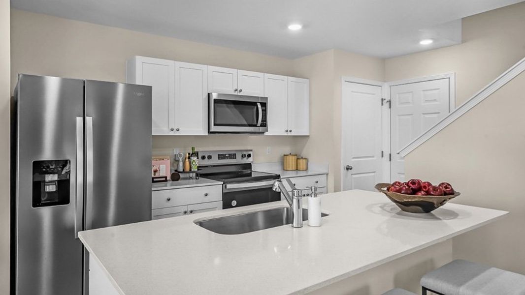 Furnished interior view inside a new home in North Village Townes, Greensboro (Image 11).