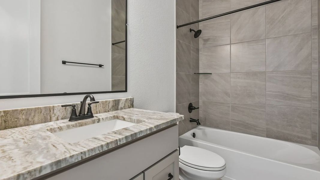 Furnished interior view inside a new home in Artavia, Conroe (Image 12).