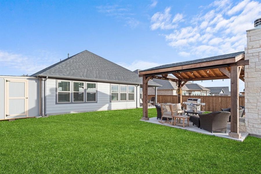 Exterior details and patio area of a home in Madero, Haslet (Image 20).