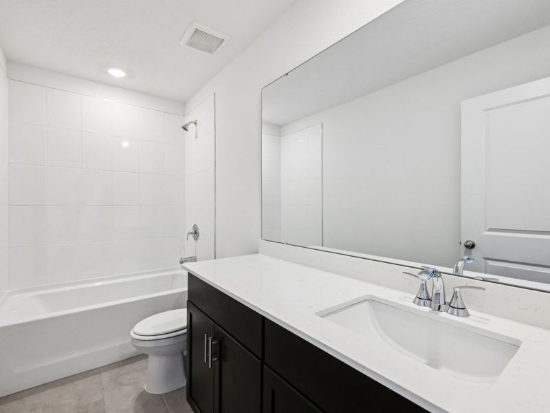 Furnished interior view inside a new home in The Reserve at Hammock Oaks - Signature Series, Lady Lake (Image 6).