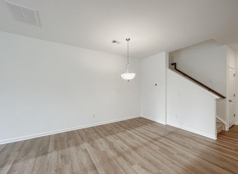 Spacious, unfurnished interior of a new home in East Main Townes, Spartanburg (Image 16).