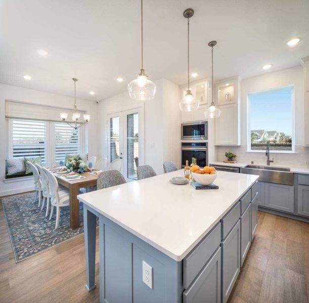 Representative furnished interior of a home built from the Derby Plan by Highland Homes in Bridgeland Central: The Cottages, Cypress (Image 7).
