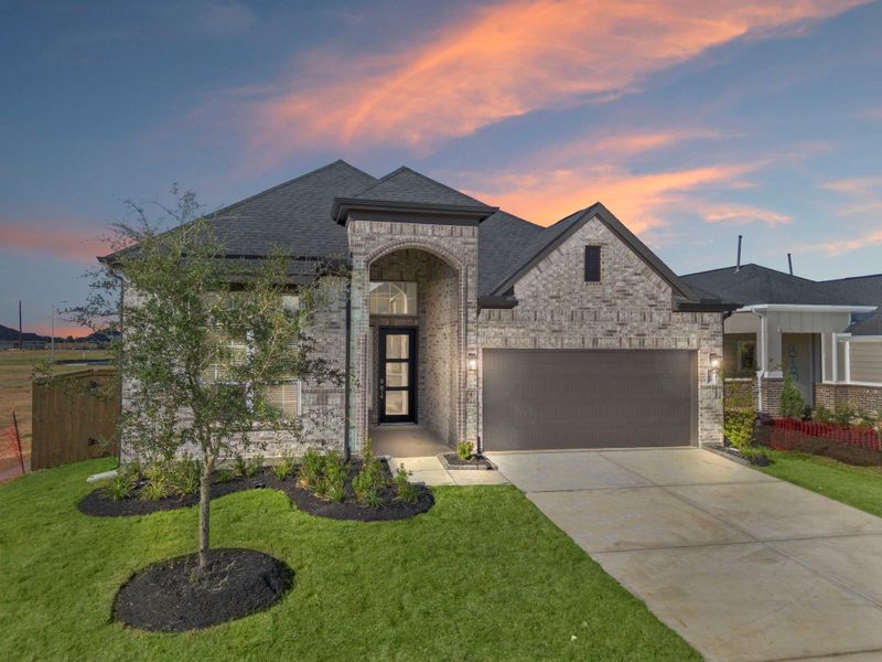 Front exterior of a new home in Attwater, Waller, TX, highlighting curb appeal (Image 2). Front exterior of a new home in Attwater, Waller, TX, highlighting curb appeal (Image 2).