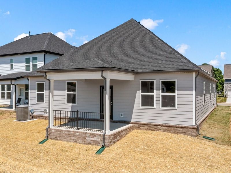 Exterior details and patio area of a home in Woods Crossing, Gallatin (Image 29).