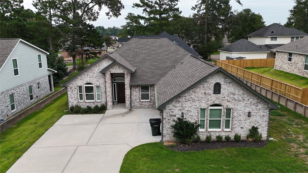Front exterior of a new home in , Huntsville, TX, highlighting curb appeal (Image 18). Front exterior of a new home in , Huntsville, TX, highlighting curb appeal (Image 18).