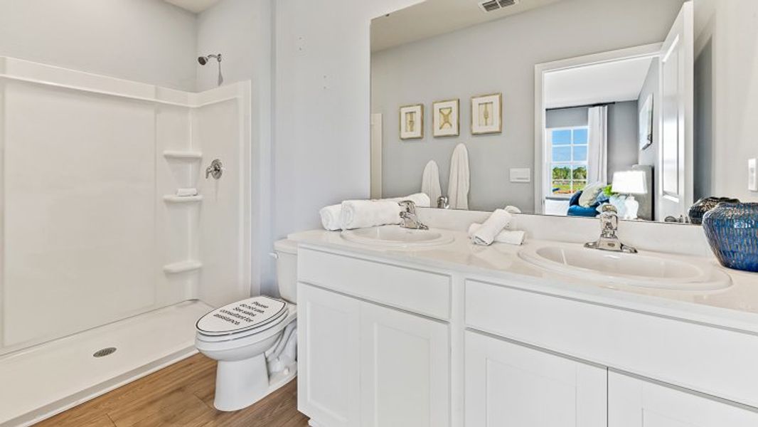 Representative furnished interior of a home built from the Pearson B by D.R. Horton in Townes at Island Lake, Pinellas Park (Image 16).