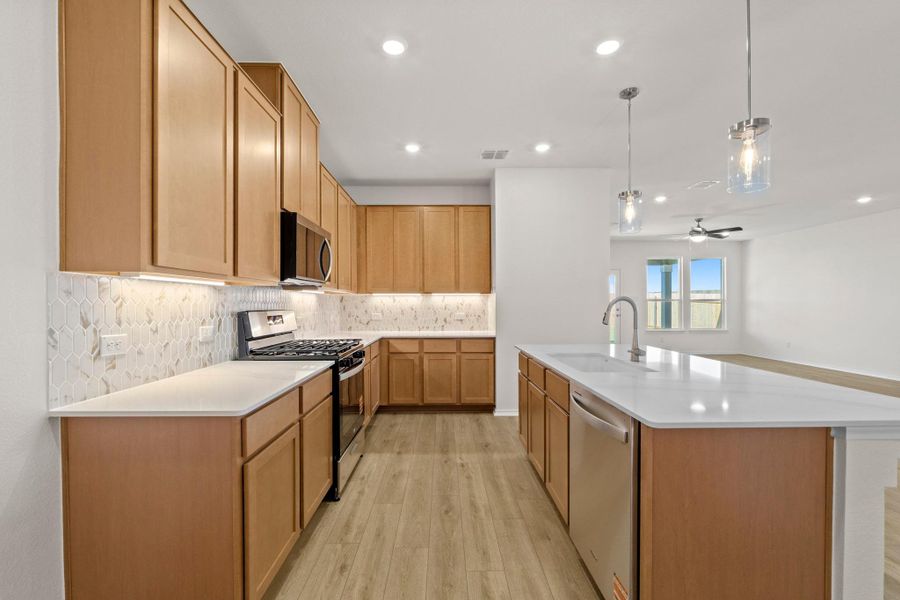 Furnished interior view inside a new home in Salerno - Classic Collection, Round Rock (Image 9). Furnished interior view inside a new home in Salerno - Classic Collection, Round Rock (Image 9).