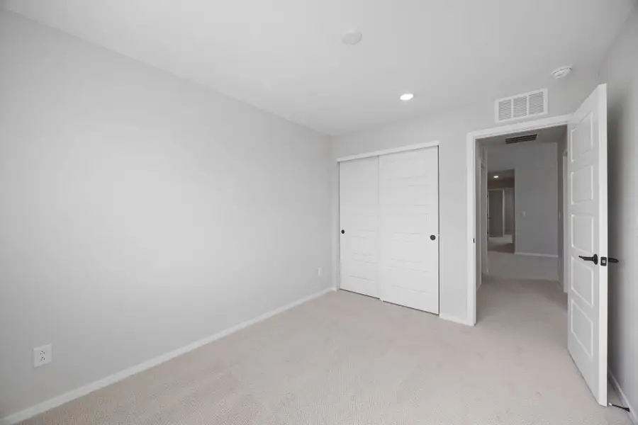 Spacious, unfurnished interior of a new home in Sky Ranch, Watkins (Image 20).