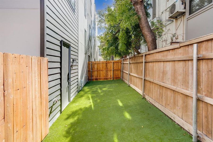View of fenced backyard