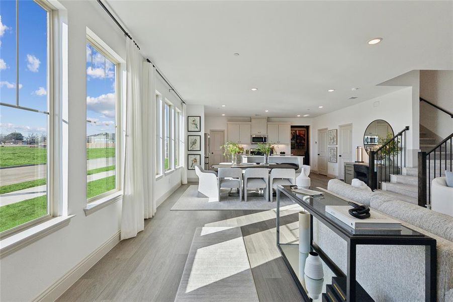 Featuring walls of windows throughout the main floor, this beautiful home is filled with natural light.