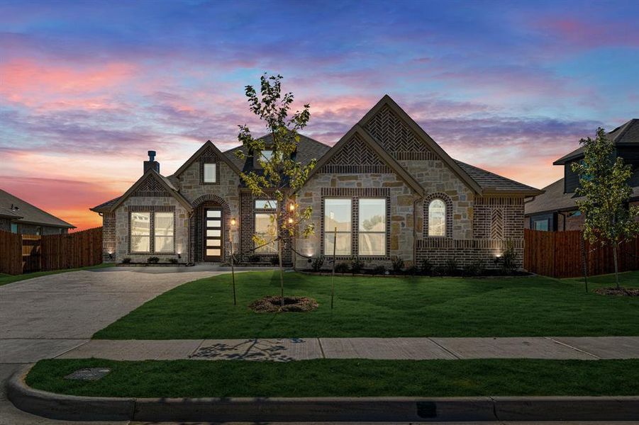 Front exterior of a new home in Villages of Walnut Grove, Midlothian, TX, highlighting curb appeal (Image 1).