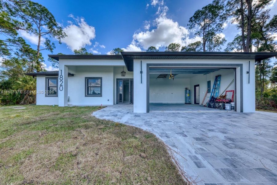 Exterior details and patio area of a home in , Lehigh Acres (Image 3).