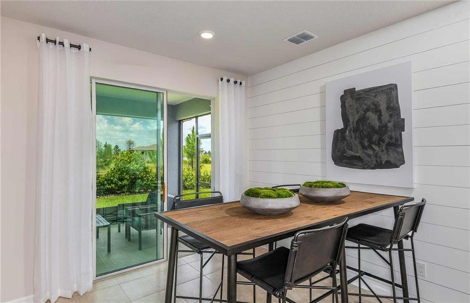Exterior details and patio area of a home in Sun City Peachtree, Griffin (Image 3).