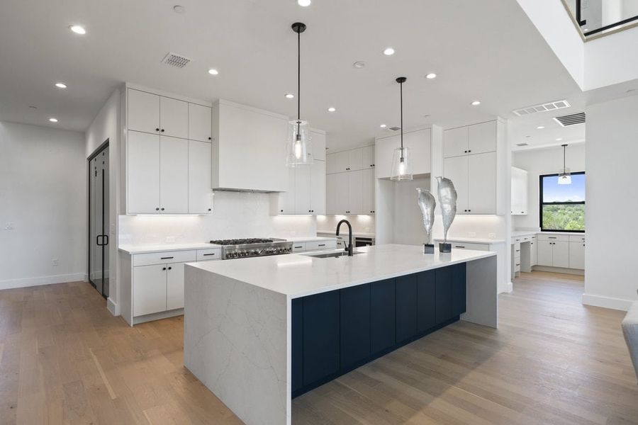 Furnished interior view inside a new home in Milky Way at River Place, Austin (Image 32). Furnished interior view inside a new home in Milky Way at River Place, Austin (Image 32).