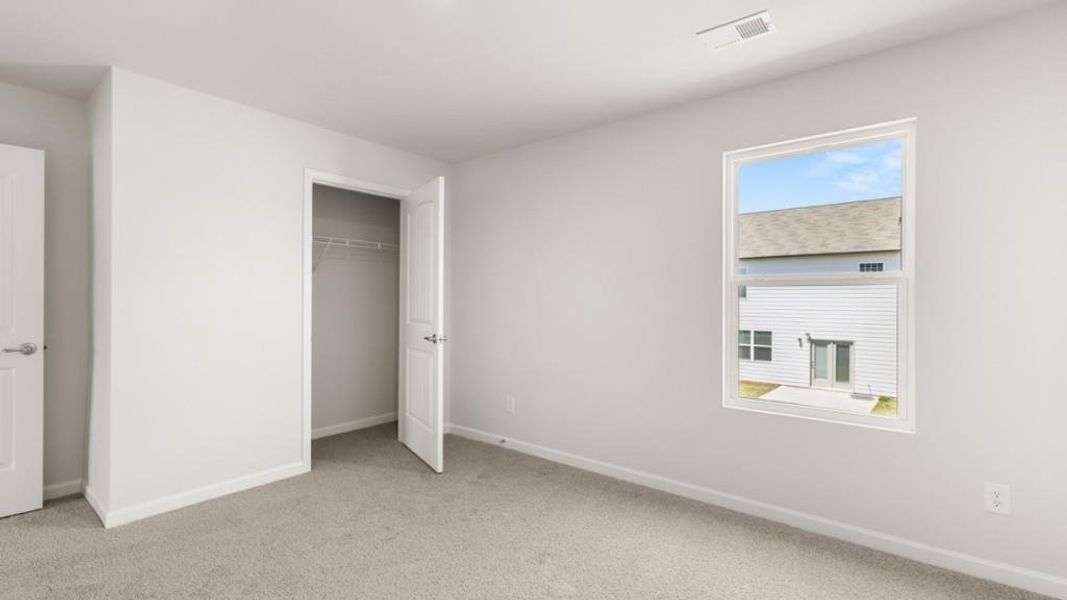 Spacious, unfurnished interior of a new home in Fairway 17 at Mirror Lake, Villa Rica (Image 25).