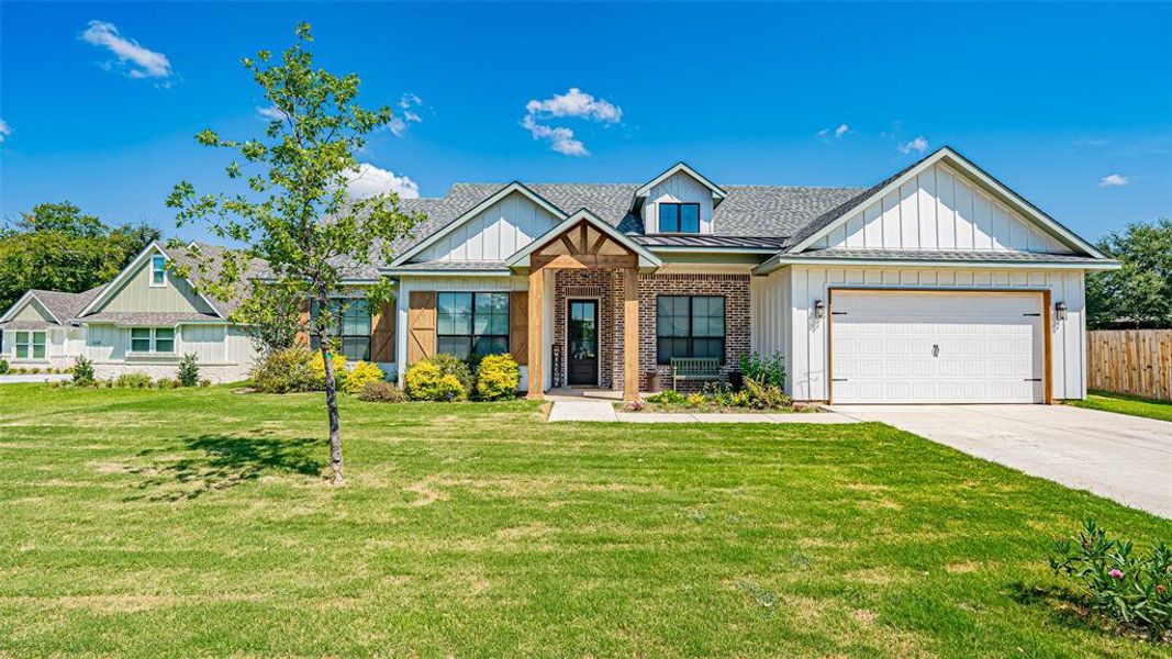 Front exterior of a new home in , Glen Rose, TX, highlighting curb appeal (Image 19). Front exterior of a new home in , Glen Rose, TX, highlighting curb appeal (Image 19).