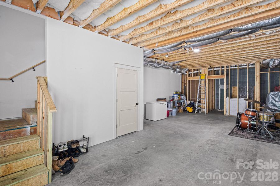 Unfinished lower level with potential to add future bedroom and full bathroom