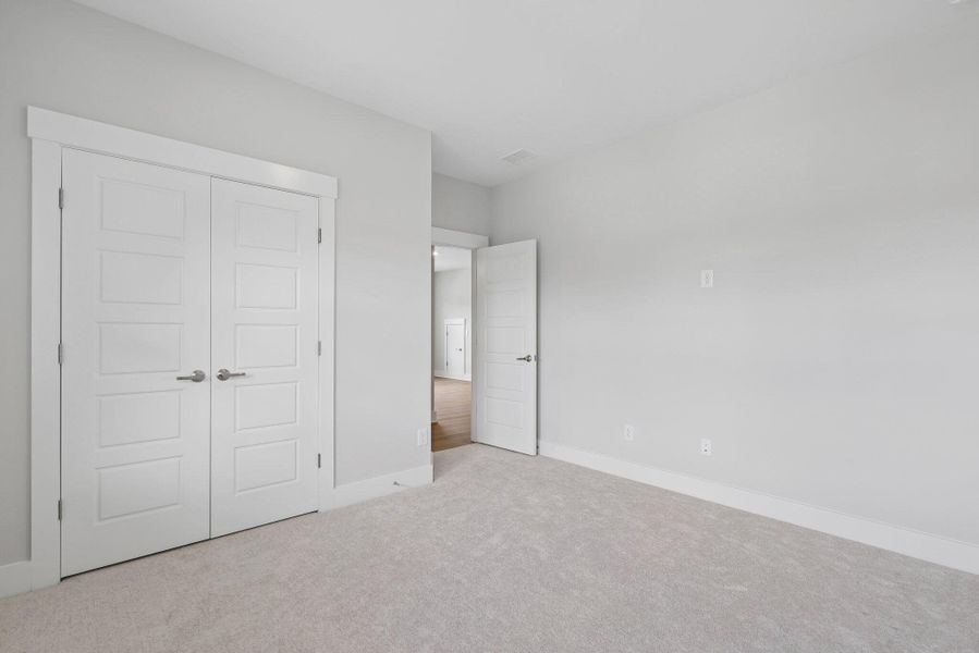 Spacious, unfurnished interior of a new home in Hidden Ponds Reserve, Awendaw (Image 45).