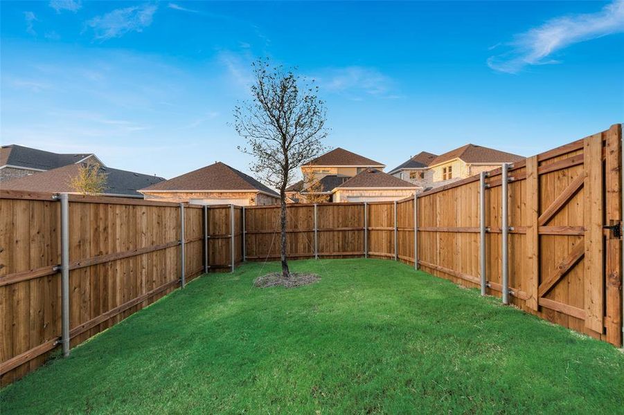 Exterior details and patio area of a home in Arbors at Legacy Hills, Celina (Image 18). Exterior details and patio area of a home in Arbors at Legacy Hills, Celina (Image 18).