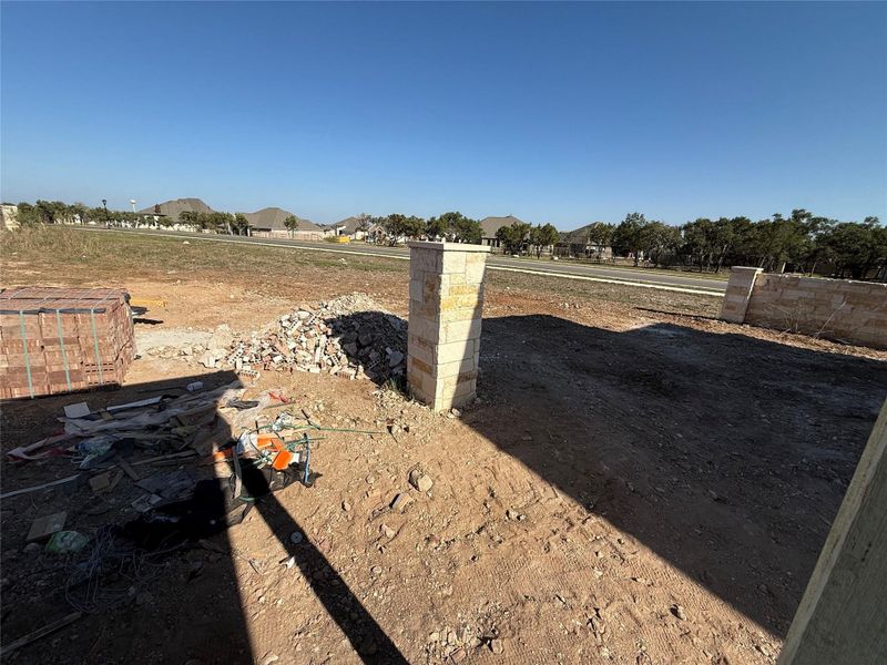 In-progress construction of a new home in The Cottages at La Cima, San Marcos, TX (Image 28).