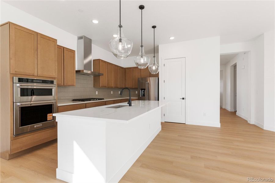 Furnished interior view inside a new home in Dillon Pointe - Journey, Broomfield (Image 7).