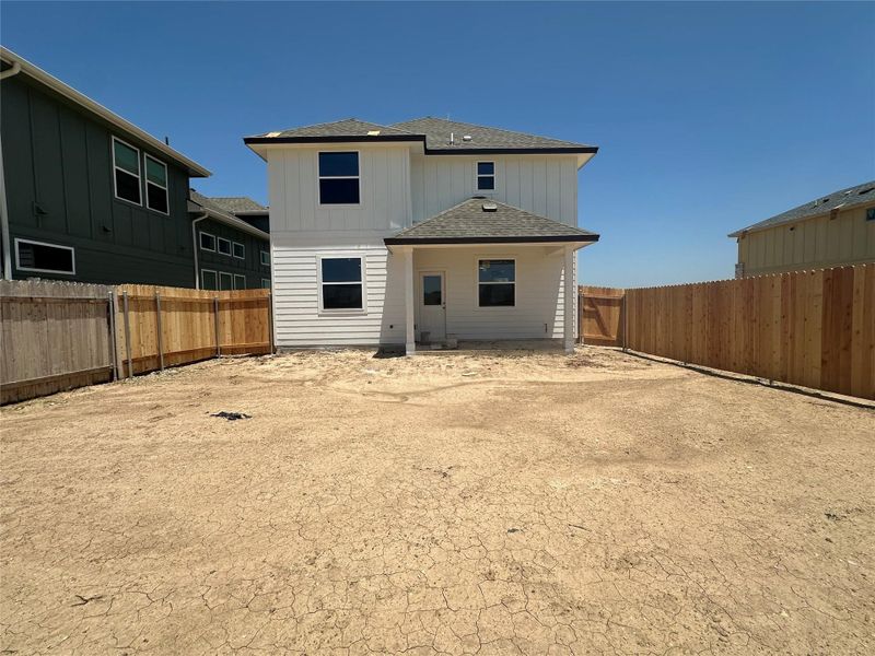Exterior details and patio area of a home in Porter Country, Buda (Image 3).
