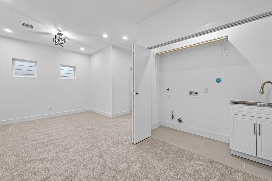 Versatile open space perfect for a game room, family area, or home office. Versatile open space perfect for a game room, family area, or home office.