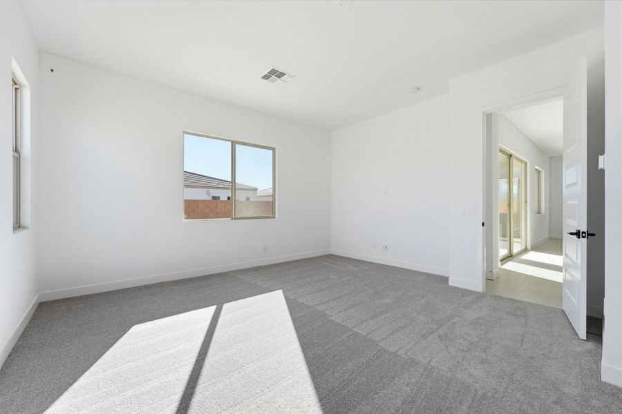 Spacious, unfurnished interior of a new home in Combs Ranch, San Tan Valley (Image 24).