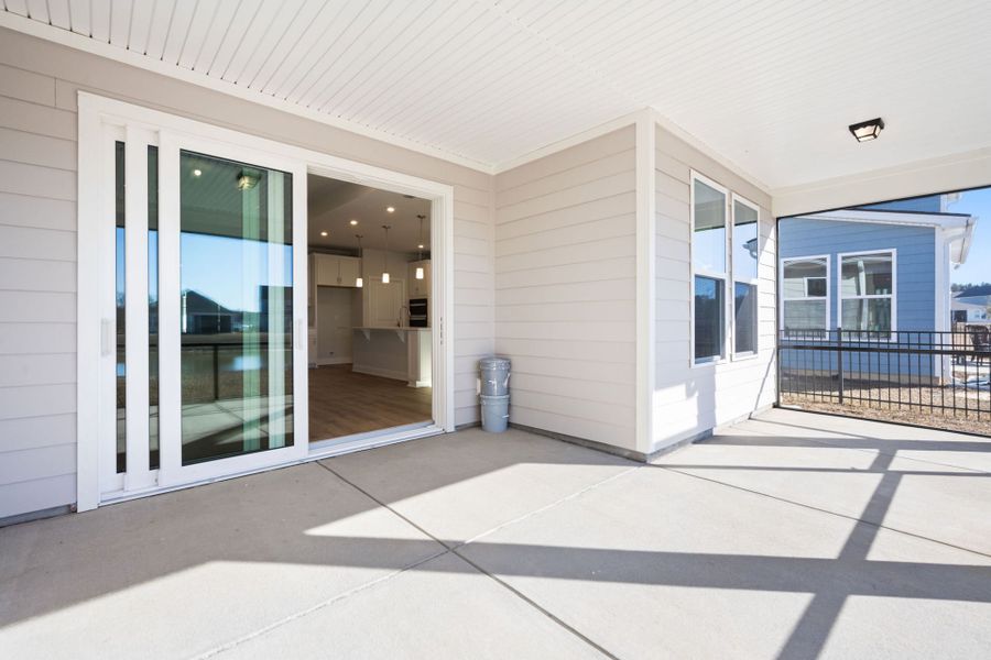 Exterior details and patio area of a home in Midpoint at New Riverside, Bluffton (Image 4).
