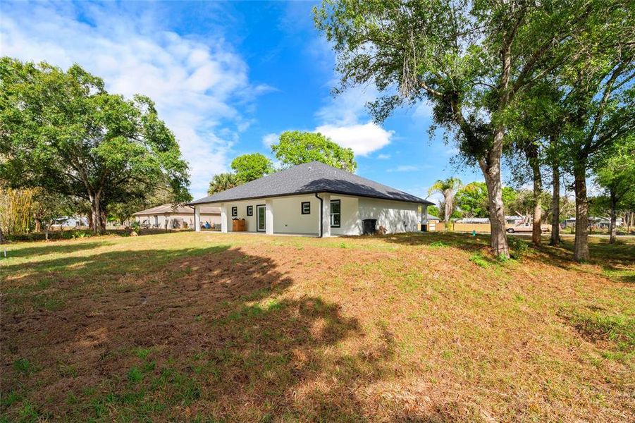 Exterior details and patio area of a home in , Okeechobee (Image 29).