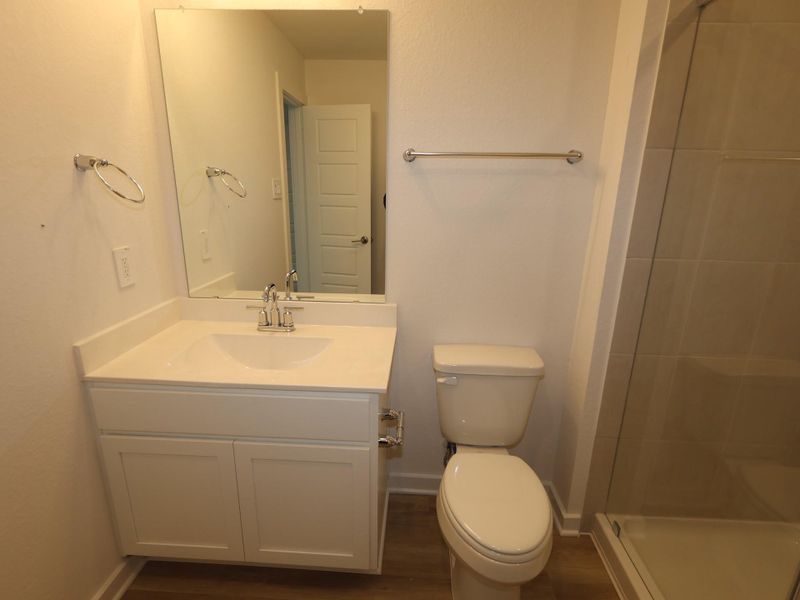 Furnished interior view inside a new home in Pinewood at Grand Texas, New Caney (Image 7).