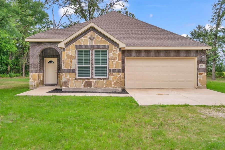 Front entry garage and extra parking.